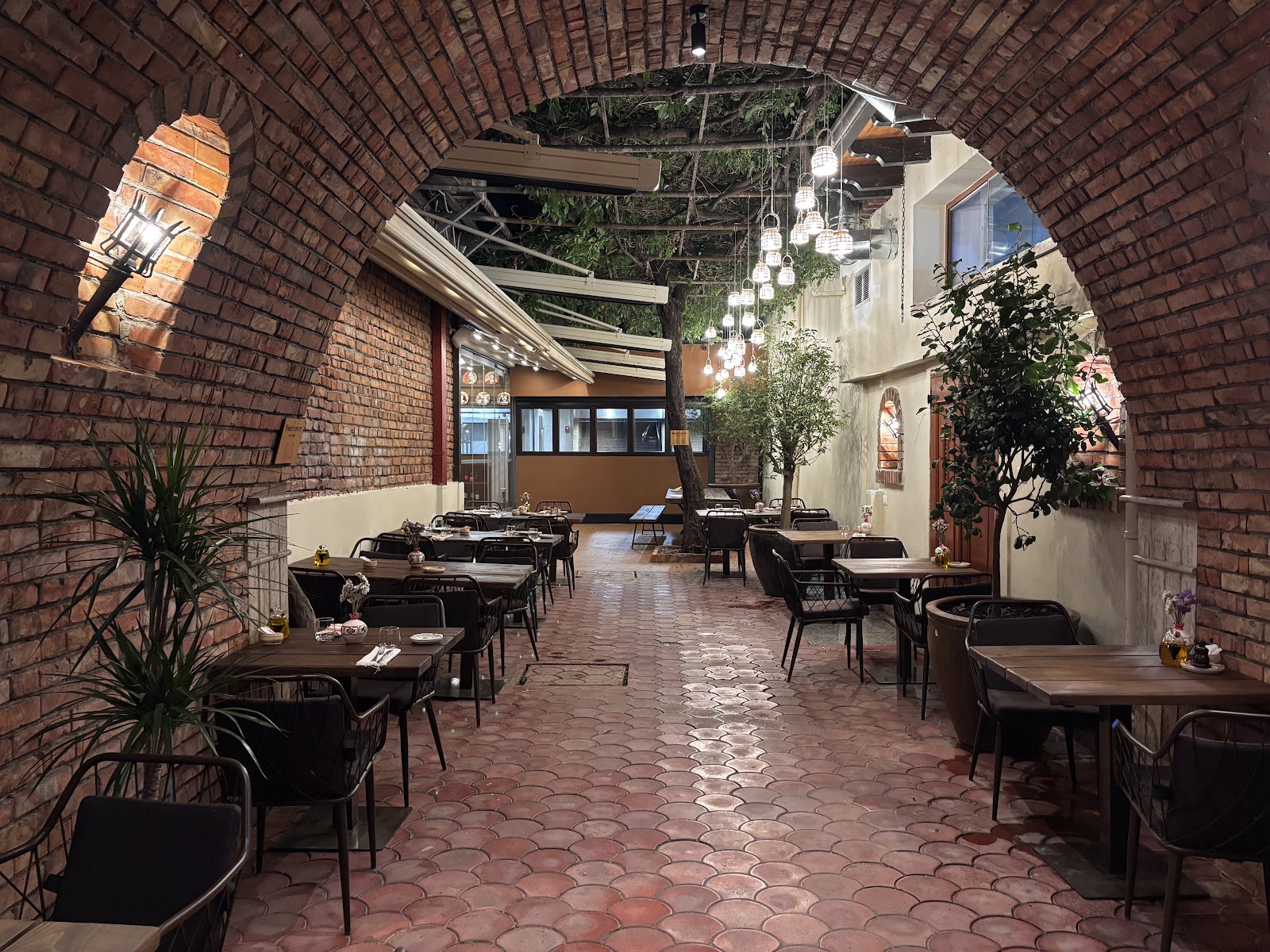 Jarna main dining room with brick arches
